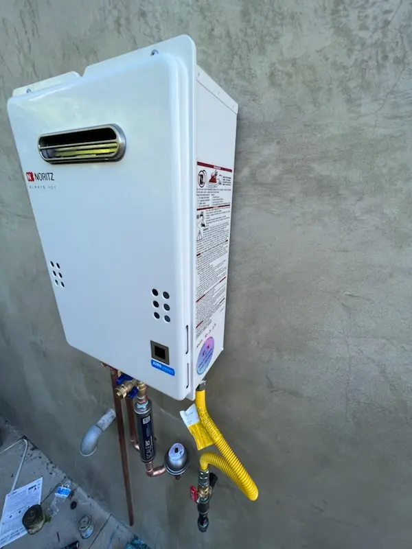 Tankless water heater installation for Kirby Manor homes